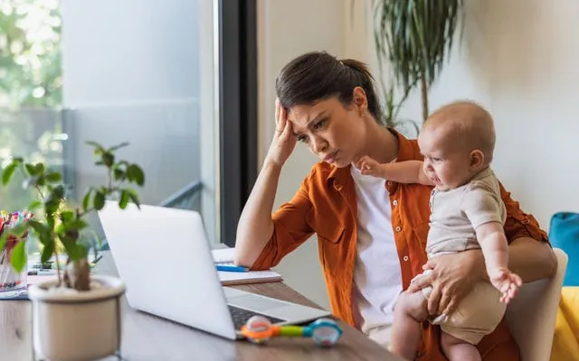 A mother and baby in the image accompanying Forbes' women's health AI coverage